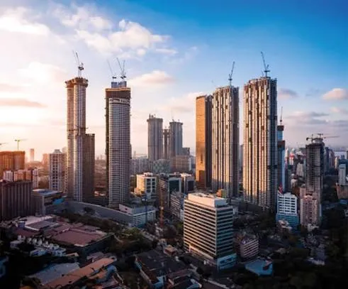 Vibrant international sunset skyline over modern structural skyscrapers