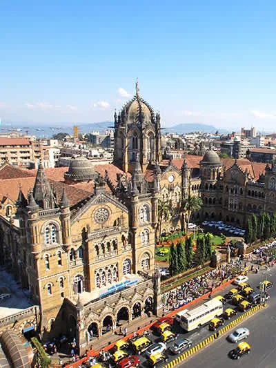 Dense blue-toned high density Mumbai skyline background for footer